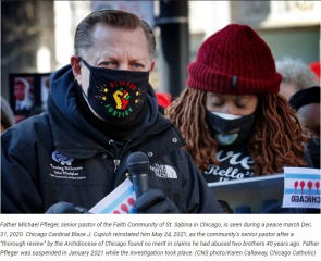 Father Michael Pfleger, senior pastor of the Faith Community of St. Sabina in Chicago, is seen during a peace march Dec. 31, 2020. Chicago Cardinal Blase J. Cupich reinstated him May 24, 2021, as the community's senior pastor after a 